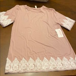 Light mauve and cream lace shirt.